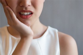 close up of a woman who needs a root canal in Marshall