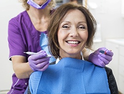 Dental patient enjoying the benefits of dental crowns in Marshall