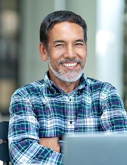 Confident man smiling with dental implants in Marshall