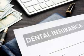 Dental insurance paperwork for the cost of dentures in Marshall
