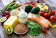 Colorful, healthy variety of food laid out on tabletop