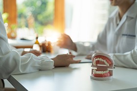 Dentist and patient discussing sedation options for upcoming treatment