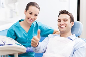 man giving thumbs up and not worrying about the cost of root canals in Marshall