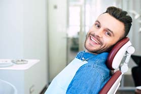 Man smiling before oral conscious sedation in Marshall, TX