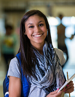 girl at school with backpack on