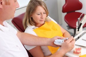 dentist talking to patient