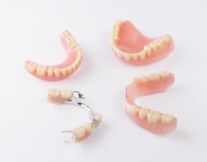 Group of partials and full dentures in Marshall