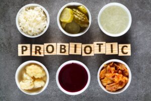 Table with bowls of foods that are rich in probiotics